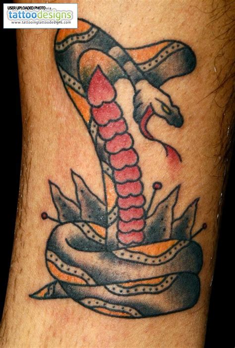 Why just get a ouroboros tattoo when you can get one reminiscent of the tree of life and the two of pentacles from the thoth tarot deck. Snakes: Snakes Tattoo Designs