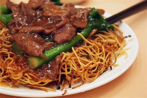 Crispy Cantonese Style Stir Fried Noodles With Sautéed Beef In A Gooey