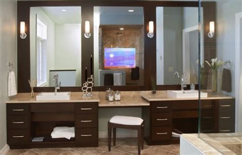 The sconces are by ozone, the bathroom vanity and tub are by waterworks, and the fittings are by lefroy brooks. Creating Bathroom Lighting that Commands Attention