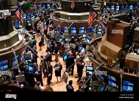 Stockbrokers Busy On The Trading Floor Of The New York Stock Exchange