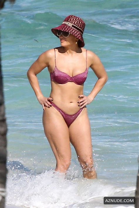 Jennifer Lopez Sexy Looking Hot In A Purple Bikini On The Beach In