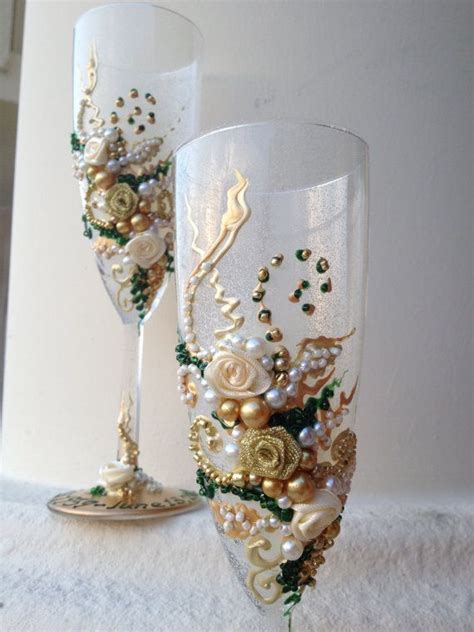 This unique card holder features a house shaped design glass sides and is accented with gold. Wonderful Hand decorated Wedding champagne glasses in ...