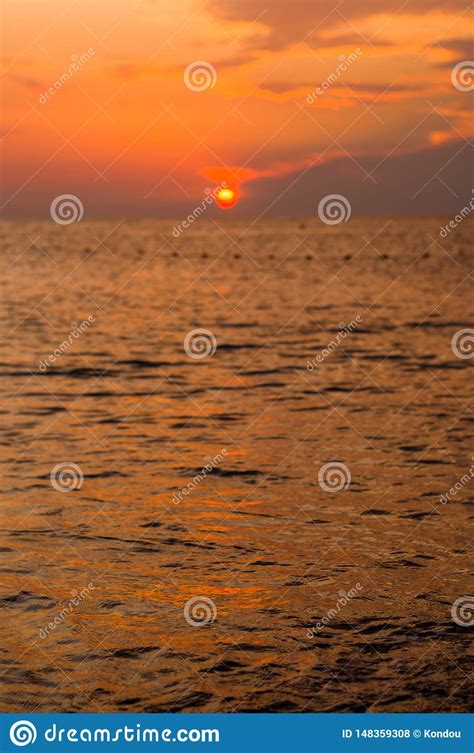 Amazing Sea Sunset On The Pebble Beach The Sun Waves Clouds Stock