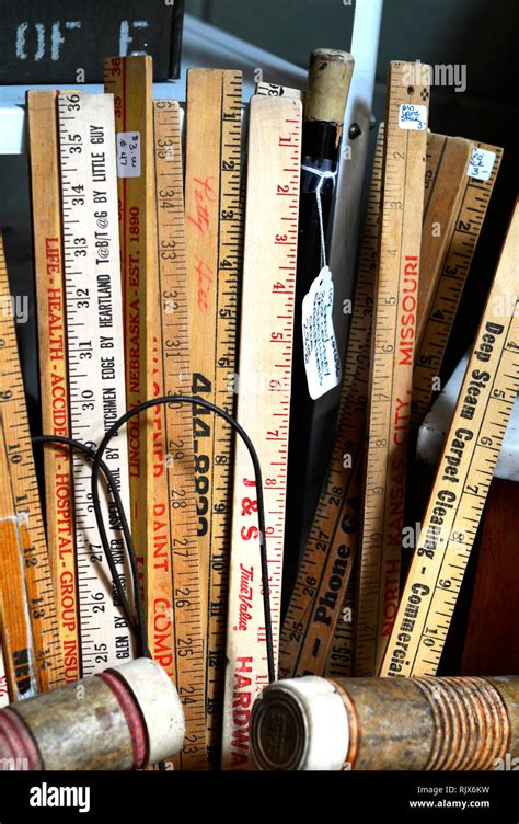 Vintage Yardsticks For Sale At An Antique Shop Stock Photo Alamy