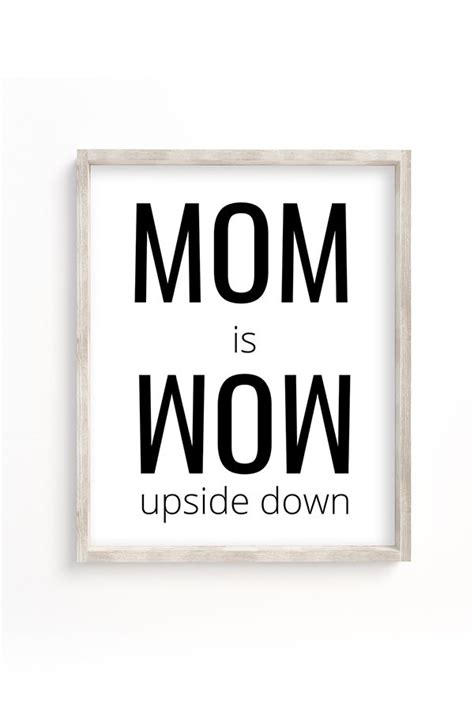 A Black And White Poster With The Words Mom Is Wow Upside Down On Its Side
