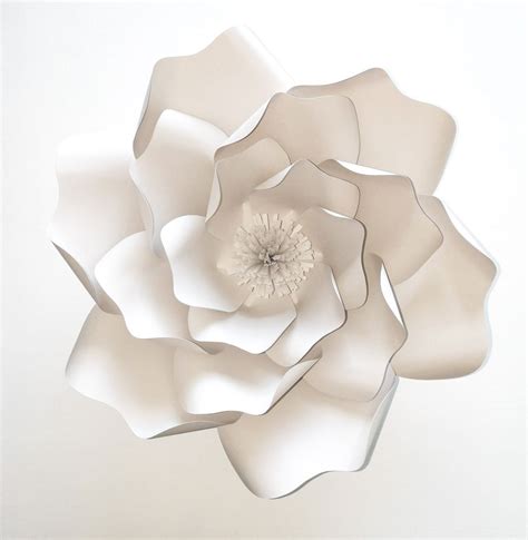 We believe making paper flowers will solve the groom's allergy issues in addition to giving all wedding decor a stylish, artful look. DIY Minimalist Paper Flower Wedding Decorations - Once Wed