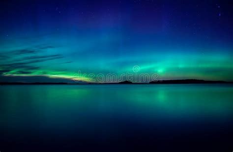 Northern Lights Dancing Over Lake Stock Photo Image Of Outdoor