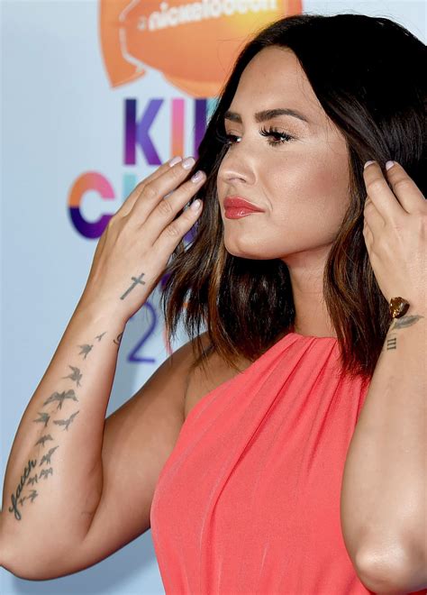 Demi Lovatos Tattoos Locations Details Meanings