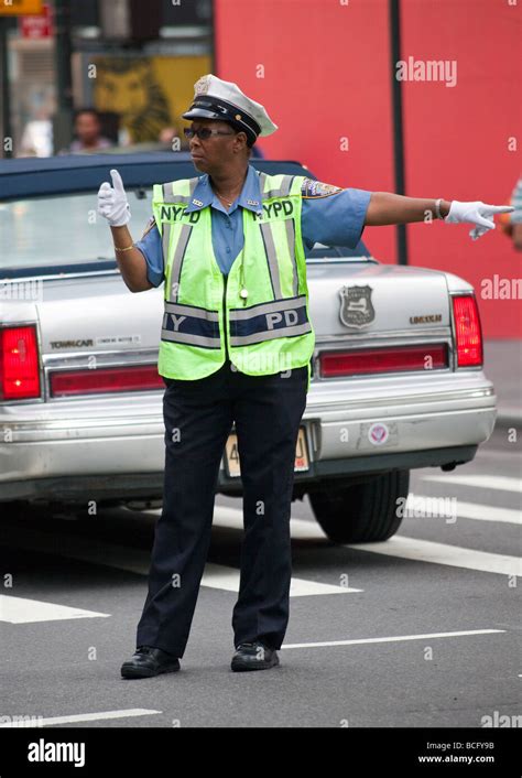 Policeman Directing Traffic In Manhattan New York City Usa Stock