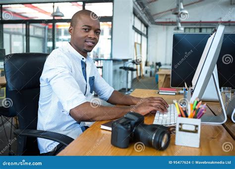 Graphic Designer Working At Desk Stock Photo Image Of Happy Artist