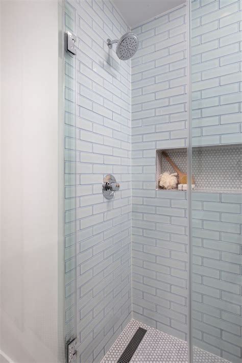 Showers can be placed in the corner, giving you breathing space in the rest of the bathroom. We replaced the tub with a custom tiled walk-in shower ...
