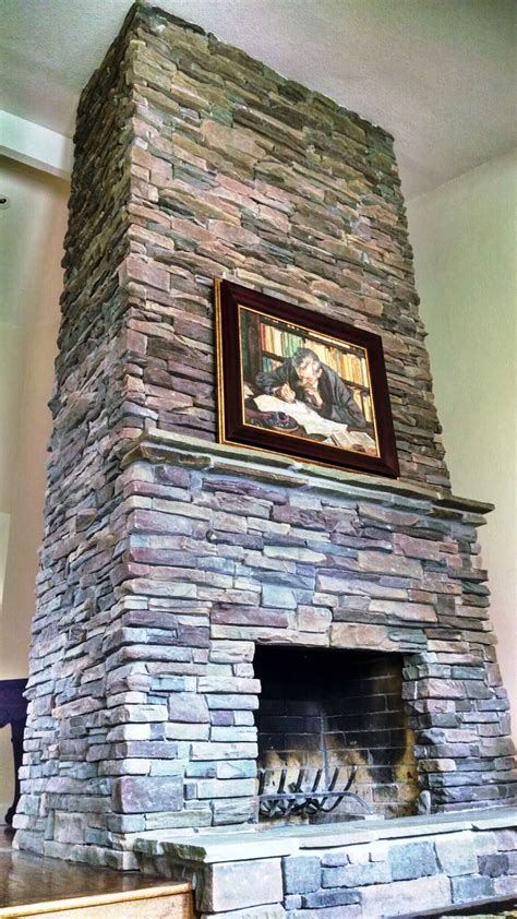 Dry Stacked Stone Fireplace By Cribari Construction Provides Both Drama