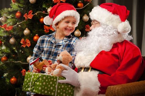 Santa Claus And A Little Boy Stock Image Image Of Package T 62795617