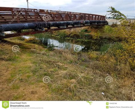 Rusty Bridge Over A Small Creek Stock Photo Image Of Graffiti Small