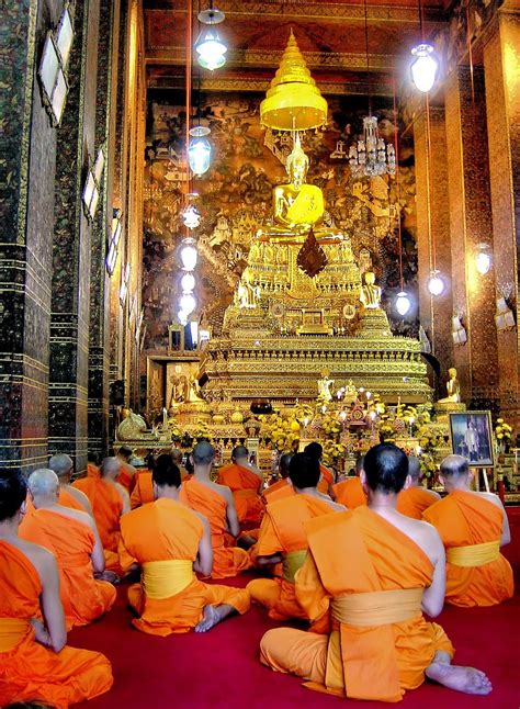 Buddhist Monks In Prayer At Wat Ratchanatdaram Worawihan In Bangkok