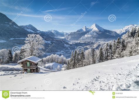 Idyllic Winter Landscape In The Alps With Mountain Lodge Stock Photo