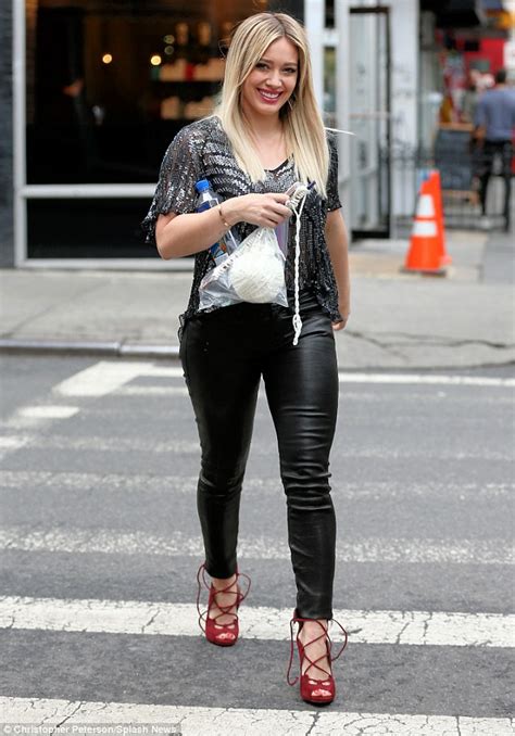 Hilary Duff Shows Off Her Shapely Pins In Form Fitting Leather Trousers