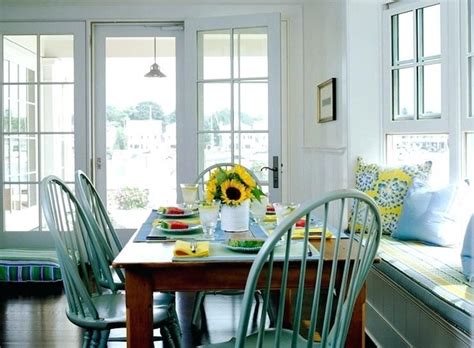Whitewashed wood, rope accents, rattan legs, and cane backing are just a few examples of modern coastal furniture elements. dining room with teal windsor chairs - Google Search ...