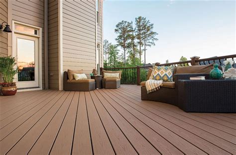 Wood flooring transforms a balcony, deck, or concrete pad into an inviting outdoor patio. 8 Outdoor Flooring Options for Style & Comfort ...