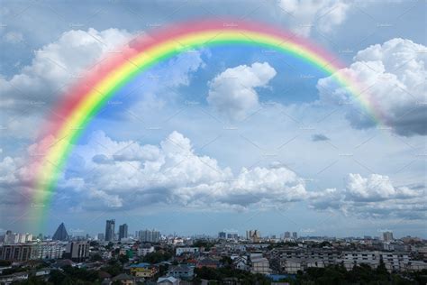 Rainbow In Cloudy Sky For Background Containing Air Atmosphere And