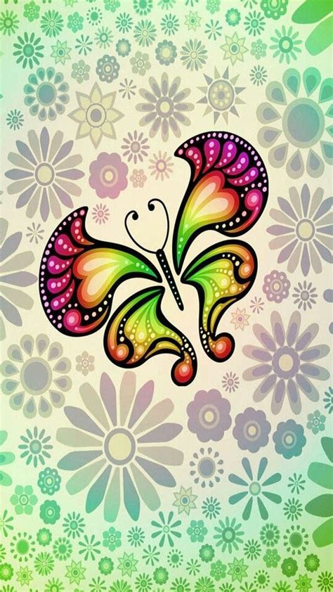 A Colorful Butterfly Sitting On Top Of A Green And White Flower