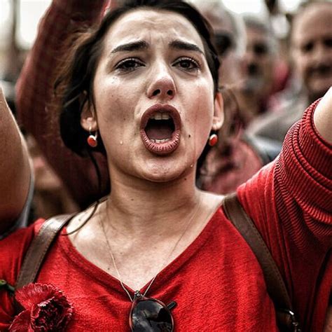 greek woman demonstrates in central athens during the mayday celebrations aris messinis 2017