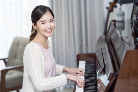 Asian Woman Sing A Song And Play Piano Stock Image Image Of Pianist