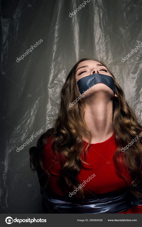 A Beautiful Girl With A Gag In Her Mouth As A Symbol Of Censorship Stock Photo By Drouk