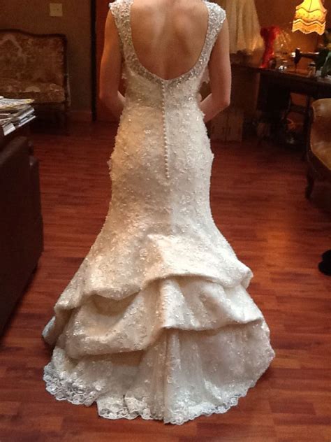 Mermaid wedding dress with bow. waterfall bustle with the lining on mermaid style wedding ...
