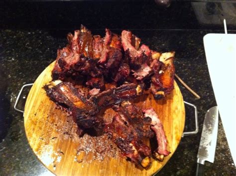 The vivid scarlet smoked ring. How to Barbecue Beef Ribs on the Grill | Delishably