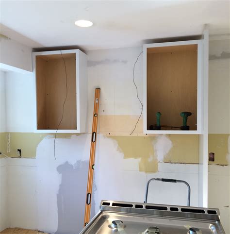 Installing your own kitchen cabinets may seem like a complicated task, but the process is actually quite simple. Kitchen Renovation: The Cabinets - Jenna Burger