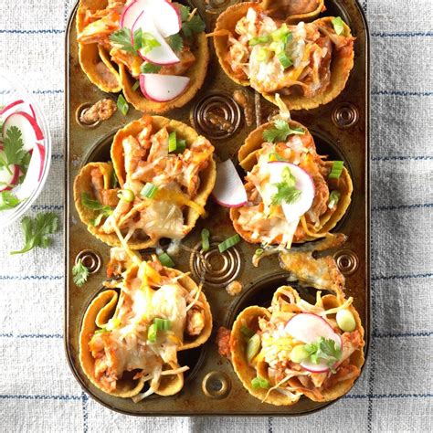 In another bowl, combine tomatoes, red onion, 1/2 teaspoon garlic, 1/4 cup cilantro and olive oil. Chicken Tostada Cups Recipe: How to Make It | Taste of Home
