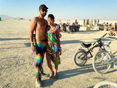 This Couple Coordinated Their Brights Burning Man Outfits Burning Man Fashion Crazy Costumes