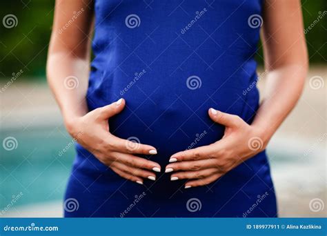 Women`s Hands Hug Pregnant Belly In Blue Dress Stock Image Image Of Maternity Hand 189977911
