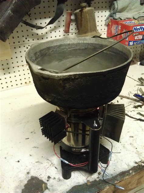 Another way is to burn the refined oil in an internal combustion engine attached to a generator/alternator. Thermoelectric Wood Cookstove BioHeavy - Dan's Workshop Blog