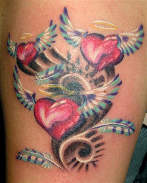 Winged Hearts Tattoo Tattoo Designs Tattoo Pictures