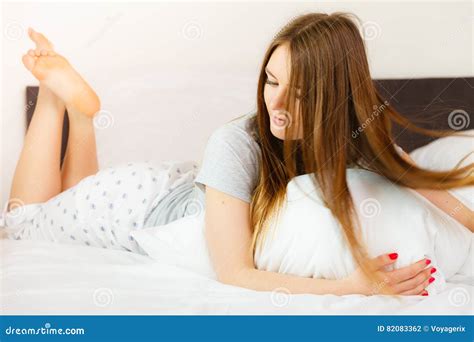 Cheerful Girl Rolling In Bed Stock Photo Image Of Sleeping Lazy