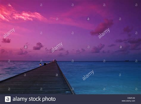 Beautiful Sunset Over The Jetty In The Maldives Indian Ocean Stock