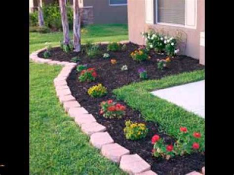 Talking of landscaping ideas for small budgets, here's another example of simple but appealing flower bed arrangements with taller, neatly trimmed hedges in the background. Easy DIY landscaping projects ideas - YouTube