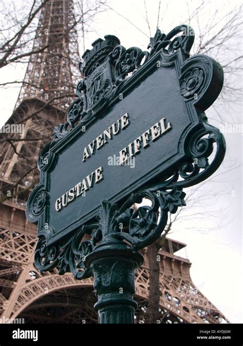 Avenue Gustave Eiffel Street Sign With The Famous Eiffel Tower In The