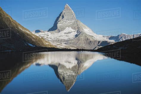 Matterhorn Mountain And Lake In Valais Switzerland Stock Photo