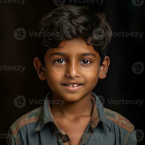 Cute Young Indian Boy Smiling On Black Background 26457064 Stock Photo