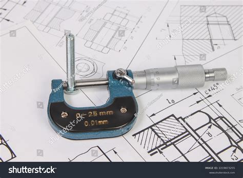 Micrometer Bolts On Background Engineering Drawings Stock Photo