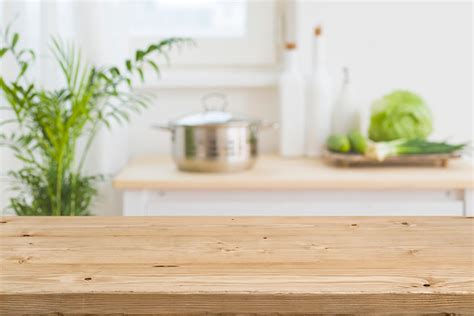 Table Top With Blurred Kitchen Interior As Background ...