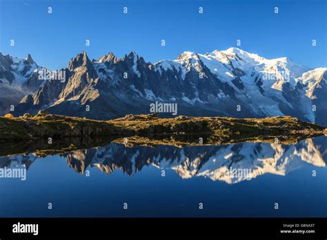 The Massif Of Mont Blanc Reflected In Lac De Cheserys Haute Savoie