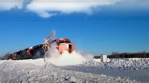 Awesome Powerful Trains Plow Through Snowy Railway Tracks
