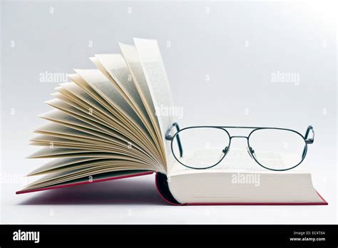Reading Glasses In An Open Book Stock Photo Alamy