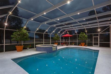 White Swimming Pool Screen Enclosure With Overhead Lighting Indoor
