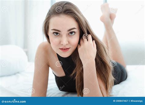 Portrait Of Attractive Woman Relaxing On Bedroom Beautiful Caucasian