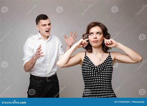Angry Couple In Love Stands And Screams To Each Other Picture Isolated